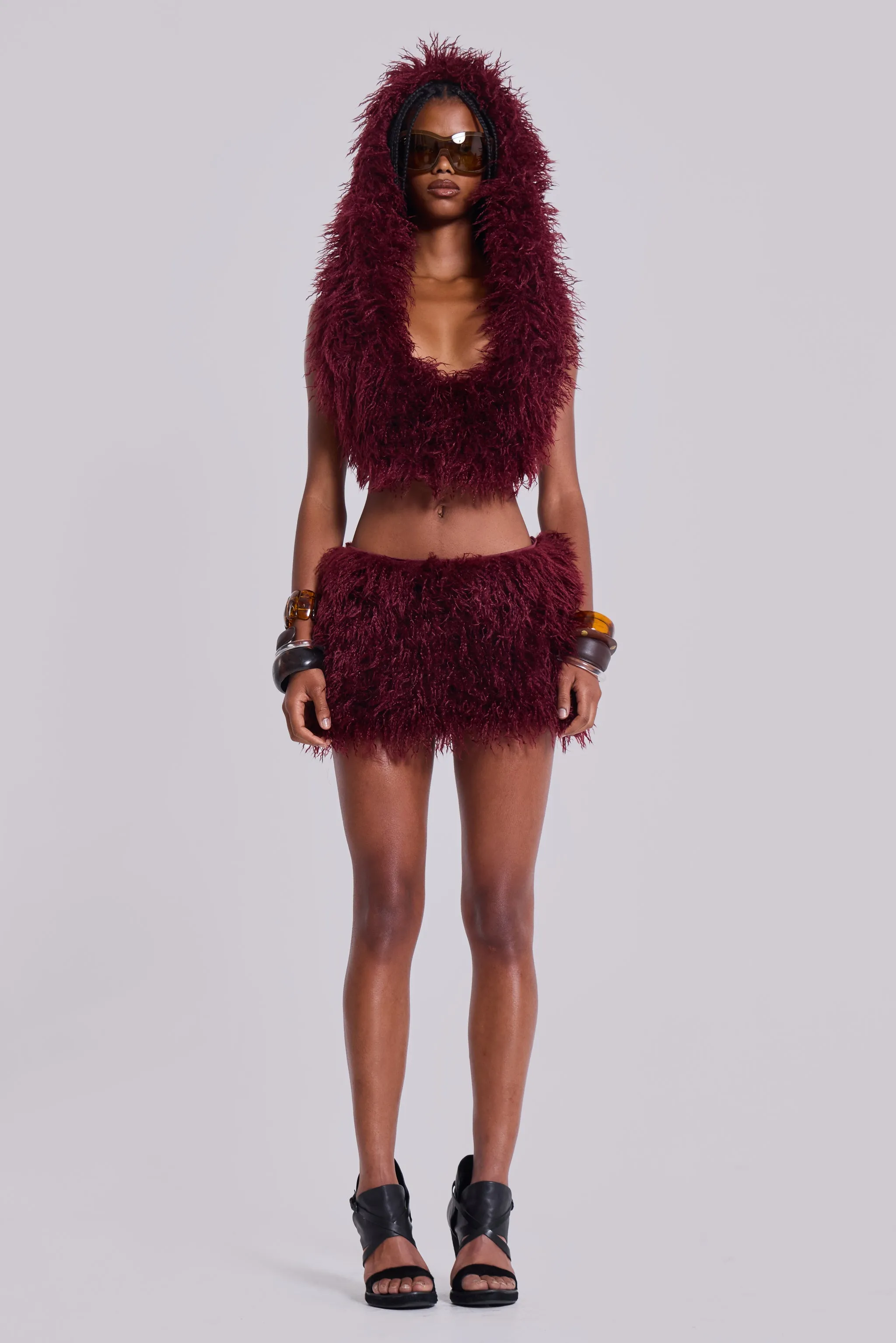 Haka Mongolian Faux Fur Mini Skirt in Wine